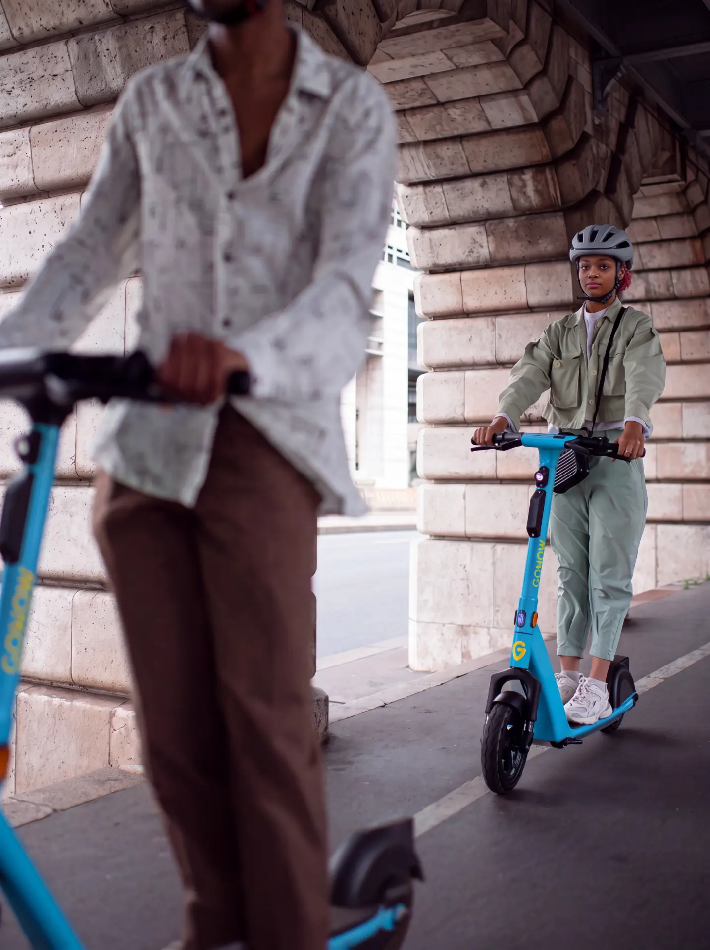 Rider in a helmet on a GONOW scooter